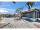 Backyard with enclosed porch and beautiful water views at 832 Seabreeze Dr, Ruskin, FL 33570