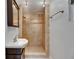 Bathroom showing walk-in shower with tile surround at 832 Seabreeze Dr, Ruskin, FL 33570