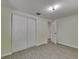 Bedroom with tile floors and double closet at 832 Seabreeze Dr, Ruskin, FL 33570