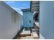 Outdoor shower area and walkway between the house and the backyard at 832 Seabreeze Dr, Ruskin, FL 33570