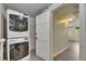 Stacked washer and dryer in laundry area at 832 Seabreeze Dr, Ruskin, FL 33570