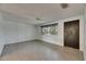 Bright, open living area featuring modern tile flooring and natural light at 832 Seabreeze Dr, Ruskin, FL 33570