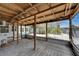 Enclosed porch features a wood ceiling, wood flooring, and views of the outdoors at 832 Seabreeze Dr, Ruskin, FL 33570