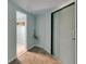 A room with tile flooring and a doorway, and visible wires on the wall at 832 Seabreeze Dr, Ruskin, FL 33570