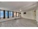 Large sunroom with wood-look tile flooring and multiple windows for natural light at 832 Seabreeze Dr, Ruskin, FL 33570