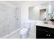 Updated bathroom features a marble tile shower and updated vanity with modern fixtures at 8345 81St Ct, Seminole, FL 33777