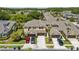 Aerial view of townhomes showcasing the community layout and landscaping at 8518 Broken Willow Ct, Tampa, FL 33647