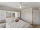 Comfortable bedroom with closet and built in storage shelves at 8518 Broken Willow Ct, Tampa, FL 33647