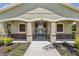 Community entrance with decorative stone accents and well-maintained landscaping at 8518 Broken Willow Ct, Tampa, FL 33647