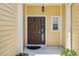 Inviting front door with decorative details and a covered entryway at 8518 Broken Willow Ct, Tampa, FL 33647