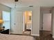 Bedroom leading to bathroom, showcasing the house layout at 10627 Mira Vista Dr, Port Richey, FL 34668