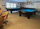 The billiard room offers residents hours of entertainment with multiple tables and comfortable seating at 10627 Mira Vista Dr, Port Richey, FL 34668