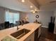 Bright and airy kitchen offers an open layout, updated appliances, and a stylish breakfast bar for casual dining at 10627 Mira Vista Dr, Port Richey, FL 34668