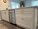 Well-appointed kitchen featuring modern appliances, sleek cabinetry, and beautiful countertops for a contemporary feel at 10627 Mira Vista Dr, Port Richey, FL 34668