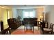 This living room is perfect for entertaining, with great lighting, cozy seating, and a warm and inviting atmosphere at 10627 Mira Vista Dr, Port Richey, FL 34668