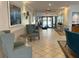 Inviting lobby featuring comfortable seating, artwork, and a bright, welcoming atmosphere for residents and guests at 10627 Mira Vista Dr, Port Richey, FL 34668