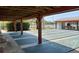 Outdoor shuffleboard courts with covered seating area and lake views enhance this community's appeal at 10627 Mira Vista Dr, Port Richey, FL 34668