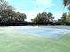 Well-maintained tennis courts offer residents recreational opportunities and beautiful tree lined landscape at 10627 Mira Vista Dr, Port Richey, FL 34668