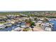 Aerial view showcasing waterfront location with canal access and neighborhood at 10716 Donbrese Ave, Tampa, FL 33615