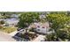 Aerial view of the property showcasing its charming exterior and lush surroundings at 10716 Donbrese Ave, Tampa, FL 33615