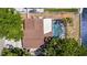 Drone shot of backyard with pool and roof at 10716 Donbrese Ave, Tampa, FL 33615