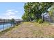 Scenic backyard highlighting the home's waterfront access and mature landscaping at 10716 Donbrese Ave, Tampa, FL 33615