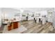 Open kitchen and dining area featuring stainless steel appliances, an island and plenty of light at 10716 Donbrese Ave, Tampa, FL 33615