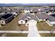 Aerial view of a suburban home featuring a landscaped yard and a neighborhood setting at 1102 Wynnmere Walk Ave, Ruskin, FL 33570