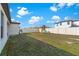 Large fenced backyard with a playset, providing a safe and fun outdoor space at 1102 Wynnmere Walk Ave, Ruskin, FL 33570