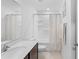 Bathroom with white vanity, toilet, and tub/shower combo with a white curtain at 1102 Wynnmere Walk Ave, Ruskin, FL 33570