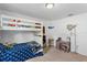 room with bunk bed, desk, and globe at 1102 Wynnmere Walk Ave, Ruskin, FL 33570