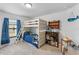 Bright bedroom with a bunk bed, cute nautical theme and ample space for study and play at 1102 Wynnmere Walk Ave, Ruskin, FL 33570