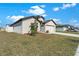 Well-maintained home featuring a two-car garage and landscaped yard, situated in a desirable neighborhood at 1102 Wynnmere Walk Ave, Ruskin, FL 33570