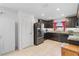 Modern kitchen with granite counters, stainless steel appliances, and plenty of cabinet space at 1102 Wynnmere Walk Ave, Ruskin, FL 33570