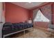 Relaxing bedroom with soft lighting and a large window at 1150 7Th Ne Ave, Largo, FL 33770