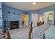 Bright bedroom boasts hardwood floors, fireplace, ceiling fan, and attached bathroom at 1150 7Th Ne Ave, Largo, FL 33770
