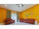 Comfortable living room area featuring neutral furniture and hardwood floors at 1150 7Th Ne Ave, Largo, FL 33770