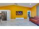 Open-concept living room with hardwood floors and tv at 1150 7Th Ne Ave, Largo, FL 33770