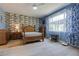 Serene main bedroom featuring a wooden bed and a decorative accent wall at 1150 7Th Ne Ave, Largo, FL 33770