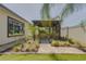 Outdoor patio lounge featuring pavers and covered lounge at 1150 7Th Ne Ave, Largo, FL 33770