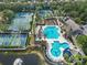 A beautiful aerial view highlights the sparkling community pool and surrounding recreation area at 11644 Meridian Point Dr, Tampa, FL 33626