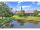 Enjoy outdoor living with a pond view from this property's backyard at 11644 Meridian Point Dr, Tampa, FL 33626
