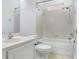 Clean bathroom featuring a shower-tub combo, vanity, and a neutral color scheme at 11644 Meridian Point Dr, Tampa, FL 33626