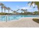 Enjoy the large, sparkling community pool with ample seating and well-manicured landscaping at 11644 Meridian Point Dr, Tampa, FL 33626