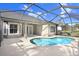 The screened-in pool provides a private outdoor space for relaxation and recreation at 11644 Meridian Point Dr, Tampa, FL 33626