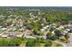 Aerial view of homes on tree-lined streets in a Gathering-friendly neighborhood at 12020 66Th Ave, Seminole, FL 33772
