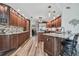 Spacious open kitchen layout with wood cabinets, granite countertops and stainless appliances at 12020 66Th Ave, Seminole, FL 33772