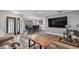 Spacious living room with dining area and hardwood floors throughout the living space at 12020 66Th Ave, Seminole, FL 33772