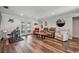Bright living room boasts hardwood floors, recessed lighting, and an open layout at 12020 66Th Ave, Seminole, FL 33772