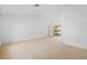 Bright and open living space with large sliding doors that leads to the outside patio at 1247 Venetia Dr, Spring Hill, FL 34608